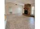 Bright living room with tile floors, a stone fireplace, and an open layout at 5213 20Th Street E Ct, Bradenton, FL 34203