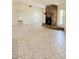 Bright living room featuring a stone fireplace and tile flooring at 5213 20Th Street E Ct, Bradenton, FL 34203