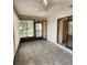 Sunroom with screened windows, a ceiling fan, and tile floors at 5213 20Th Street E Ct, Bradenton, FL 34203