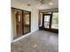 Sunroom with screened windows, a ceiling fan, and tile floors at 5213 20Th Street E Ct, Bradenton, FL 34203