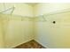 Walk-in closet with wire shelving and a small safe at 5213 20Th Street E Ct, Bradenton, FL 34203