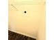 View of shelves and a secure safe located in a carpeted walk-in closet at 5213 20Th Street E Ct, Bradenton, FL 34203