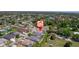 Aerial view shows a quiet, well-established neighborhood with mature trees and landscaping at 5410 Matthew Ct, Sarasota, FL 34231