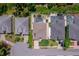 Aerial view of homes with pools, well-kept yards, and established landscaping in a residential neighborhood at 5410 Matthew Ct, Sarasota, FL 34231