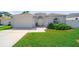 Charming single-story home featuring a well-maintained lawn and an attached two-car garage at 5410 Matthew Ct, Sarasota, FL 34231