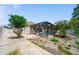 This backyard oasis has a screened-in pool, patio, and mature trees offering privacy at 5410 Matthew Ct, Sarasota, FL 34231