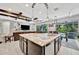 Kitchen featuring a spacious island, a breakfast bar, and an open concept design at 5515 69Th E Pl, Ellenton, FL 34222