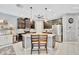 Kitchen showcasing a center island with barstool seating and stainless steel appliances at 5515 69Th E Pl, Ellenton, FL 34222