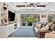 Living room with built-in shelving, providing stylish storage and display options at 5515 69Th E Pl, Ellenton, FL 34222
