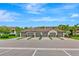 Charming townhome exteriors with well-maintained landscaping and private driveways, offering a welcoming curb appeal at 5604 Palmer Cir # 103, Bradenton, FL 34211