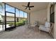 Relax on this shaded lanai with brick pavers, seating and views of the landscaped community at 5604 Palmer Cir # 103, Bradenton, FL 34211