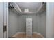 Neat walk-in closet with shelving, hanging rods, and drawers at 5750 Midnight Pass Rd # 203, Sarasota, FL 34242