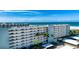 Beautiful condominium complex on the beach with lush landscaping and convenient covered parking at 5750 Midnight Pass Rd # 203, Sarasota, FL 34242