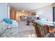 Spacious living area with dining and living room combo with modern furniture and great lighting at 5750 Midnight Pass Rd # 203, Sarasota, FL 34242