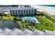 Breathtaking aerial view of the pool, grounds, and Gulf of Mexico at 5750 Midnight Pass Rd # 203, Sarasota, FL 34242
