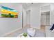 Inviting living room featuring sleek decor, modern furniture, and an open doorway to a closet at 590 De Narvaez Dr, Longboat Key, FL 34228