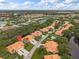 Desirable waterfront community offering serene views and lush landscaping, with terracotta tile roofs and community pool at 6755 Approach Rd # 31, Sarasota, FL 34238