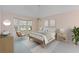 Bright bedroom featuring a bay window, elegant decor, and calming atmosphere at 6755 Approach Rd # 31, Sarasota, FL 34238