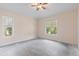 Bedroom with windows and ceiling fan provides ample natural light at 6755 Approach Rd # 31, Sarasota, FL 34238
