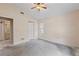 Bright bedroom with en-suite bathroom and ample natural light from the window at 6755 Approach Rd # 31, Sarasota, FL 34238
