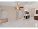 Open concept kitchen with tile flooring and access to other living areas, perfect for entertaining at 6755 Approach Rd # 31, Sarasota, FL 34238