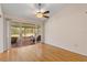 Bright room boasts of wood floors and access to screened patio at 6755 Approach Rd # 31, Sarasota, FL 34238