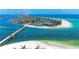 Breathtaking aerial view showcasing the coastline, bridge, and turquoise ocean waters at 681 Fox St, Longboat Key, FL 34228