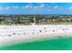 Picturesque beach with white sand and crystal-clear turquoise water at 681 Fox St, Longboat Key, FL 34228