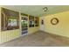 Cozy screened-in porch with concrete flooring, ceiling fan, and views of the exterior at 681 Fox St, Longboat Key, FL 34228