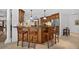 Kitchen with island, cabinets and floors at 6875 Myakka Valley Trl, Sarasota, FL 34241