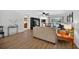 Hardwood floors, open plan view to kitchen at 6875 Myakka Valley Trl, Sarasota, FL 34241