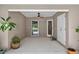 Covered patio area featuring neutral colors and ceiling fan at 6875 Myakka Valley Trl, Sarasota, FL 34241