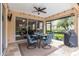 Relaxing covered patio features a dining set and direct access to the kitchen at 7343 Birds Eye Ter, Bradenton, FL 34203