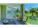 Charming balcony with seating and scenic views of the surrounding community at 7820 34Th W Ave # 102, Bradenton, FL 34209