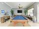 Well-lit game room featuring a billiard table, decorative accents, and a stylish interior at 7820 34Th W Ave # 102, Bradenton, FL 34209