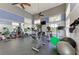 Well-equipped gym with treadmills, weights, and ample natural light, perfect for a healthy lifestyle at 7820 34Th W Ave # 102, Bradenton, FL 34209