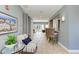 Inviting hallway with seating, a pool view and a snack bar at 7820 34Th W Ave # 102, Bradenton, FL 34209
