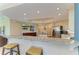 Open concept kitchen with granite countertops, stainless steel appliances, and breakfast bar seating at 7820 34Th W Ave # 102, Bradenton, FL 34209