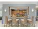 Stylish kitchen boasts granite counters, wood cabinets, stainless appliances, and a convenient breakfast bar with seating at 7820 34Th W Ave # 102, Bradenton, FL 34209