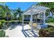 Community outdoor grill area with picnic seating and shade at 7820 34Th W Ave # 102, Bradenton, FL 34209