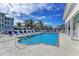 Refreshing community pool with lounge chairs and clear blue skies, offering a serene oasis at 7820 34Th W Ave # 102, Bradenton, FL 34209