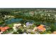 Aerial view of luxury home on a lakefront lot at 8312 Misty Lake Cir, Sarasota, FL 34241