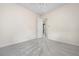 A clean bedroom featuring neutral carpet and an open doorway at 8312 Misty Lake Cir, Sarasota, FL 34241