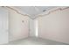 A bedroom with soft gray carpets, decorative molding and ceiling fan at 8312 Misty Lake Cir, Sarasota, FL 34241