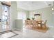 Inviting dining room with a chandelier, elegant decor, and plenty of natural light at 8312 Misty Lake Cir, Sarasota, FL 34241