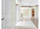 Hallway leading to living room at 8312 Misty Lake Cir, Sarasota, FL 34241