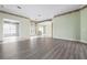 Inviting living room featuring wood floors, neutral paint and decorative trim at 8312 Misty Lake Cir, Sarasota, FL 34241