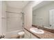 Clean bathroom featuring shower-tub combination and a sink with granite countertop at 8557 Milestone Dr, Sarasota, FL 34238