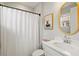Well-lit bathroom with a shower-tub combo, neutral color palette, and vanity at 9040 Tequila Sunrise Dr, Sarasota, FL 34241