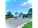 Welcome to Woodleaf, a Lakewood Ranch community, showcased by modern signage and lush landscaping at 11613 Woodleaf Dr, Lakewood Ranch, FL 34211